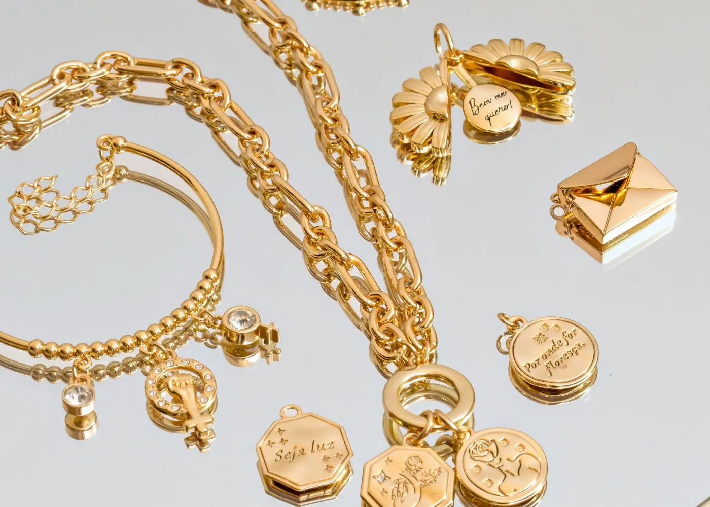 Gold jewellery on a silver tray